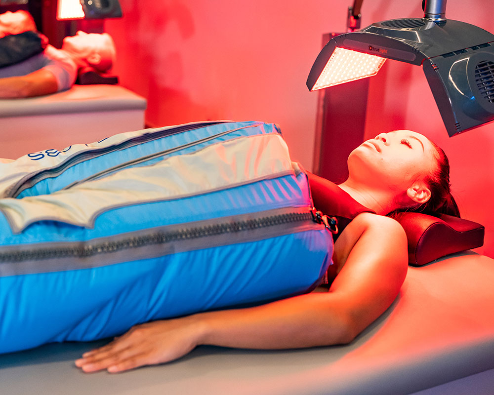 image of woman under red light therapy